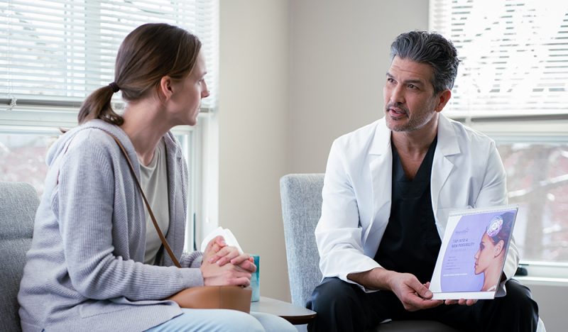 Patient Receiving a Consultation